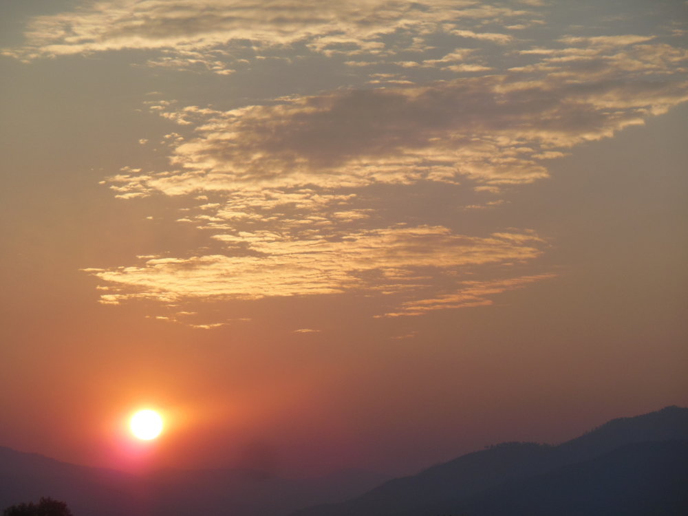 "smoky sky sunrise from el prado, new mexico" taken by wise owl deborAH
