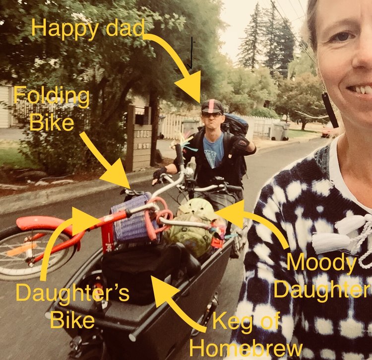 Transporting child and her bike, luggage and a keg of beer to the bus for a weekend in Portland #ebikesarecheating