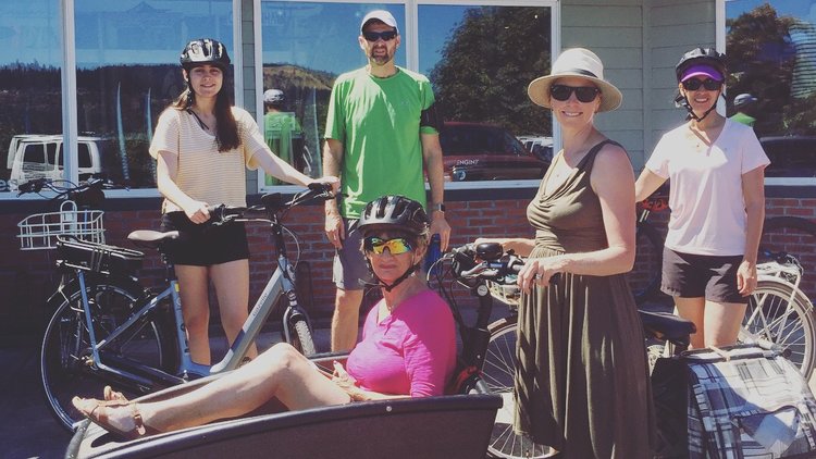 7 month pregnant and riding a 70 year old woman so she can enjoy a bike tour with her family #ebikesarecheating