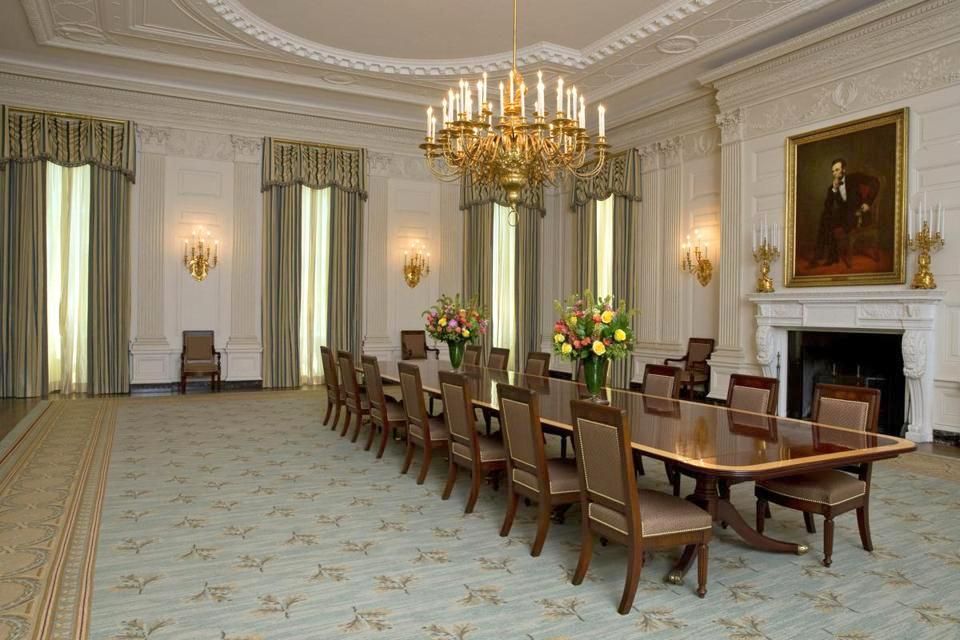 The Obama State Dining Room - both share the same chandelier and white walls...this is a room that would show best when occupied with convivial dining guests 