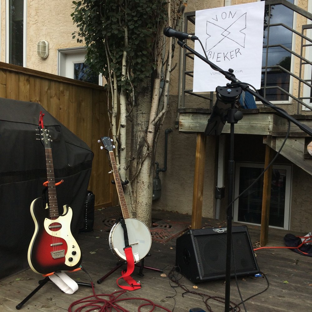 My Danelectro stands at the ready at a recent backyard block party.