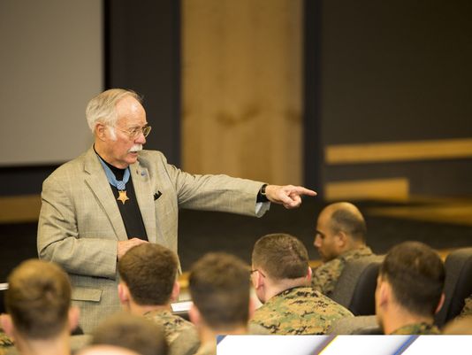 Medal of Honor recipient retired Col. Barney Barnum discussed suicide prevention with Marines aboard Camp Lejeune, N.C. It's the responsibility of all Marines to look after one another, he said.(Photo: Sgt. Scott Achtemeier/Marine Corps)