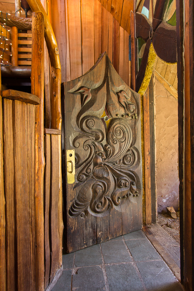 Earth House - front door/entry. Door was hand carved by Sun Ray.