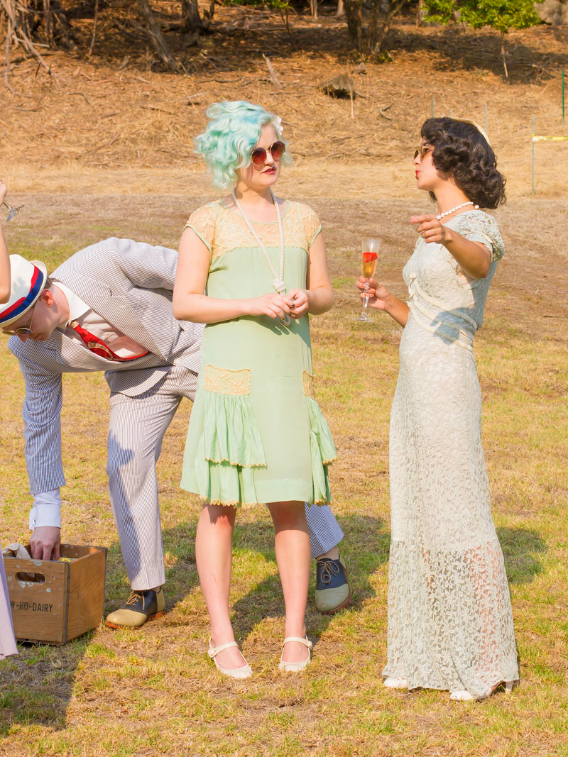  Turns out that pastel hair is  not &nbsp;an anachronism! Click this link to learn more:   Pastel hair seems so new, but is so vintage... &nbsp; In any case, both of these ladies look incredibly gorgeous. (We see you too, dapper seersucker dude!) 