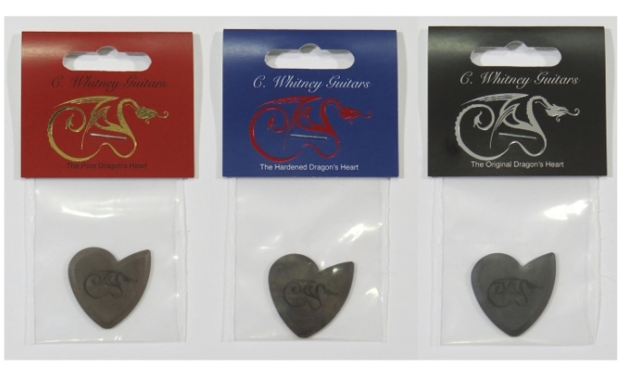  Pure, hardened, and original dragon's heart guitar picks in packaging 