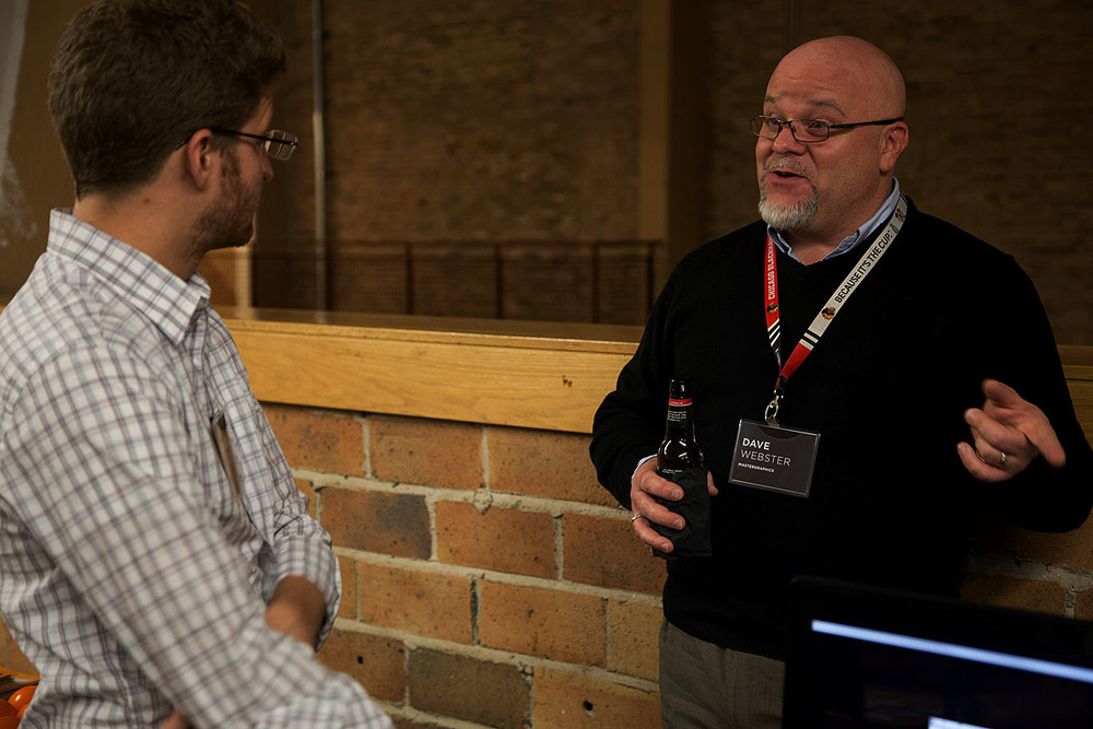 David Webster (right) of MasterGraphics discusses 3D printing with event attendee,&nbsp;Daniel Konow 