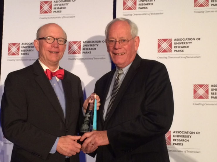In November, the Association of University Research Parks named IIT's University Technology Park as "the #1 emerging tech park in the world." Above, the author (right) accepts the award from AURP VP Greg Hyer of the UW-Madison.