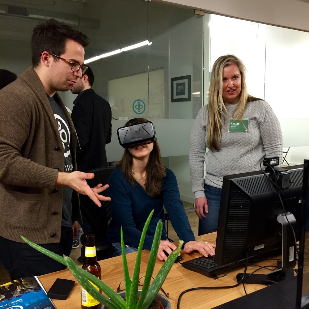 Our own Ian Manger lets the crew from Bluebeam try out one of our VR headsets. (Look up!)