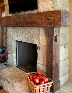 Our gorgeous hand hewn timbers make the perfect fireplace mantel and add a  centerpiece for intrigue and conversation.  Hand hewn timbers are carefully  pulled from the structure