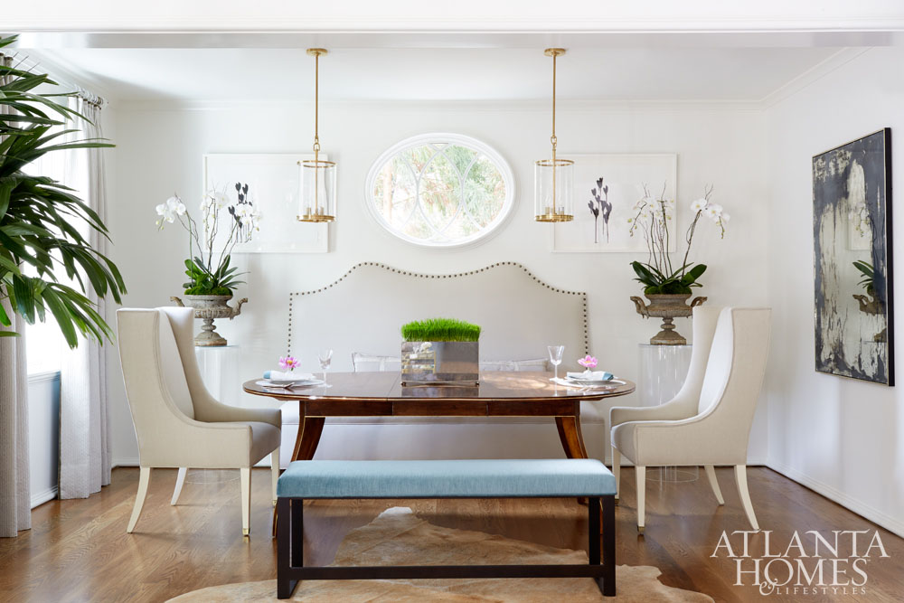 Dining room with upholstered bench and chairs in Atlanta Home for the Holidays 2016