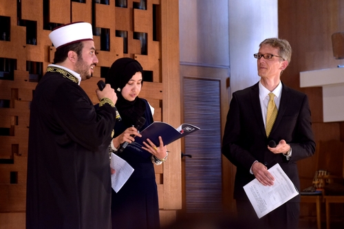 Imam Muhammed Raşit Alas (left), his interpreter, and Professor Matt Gillan