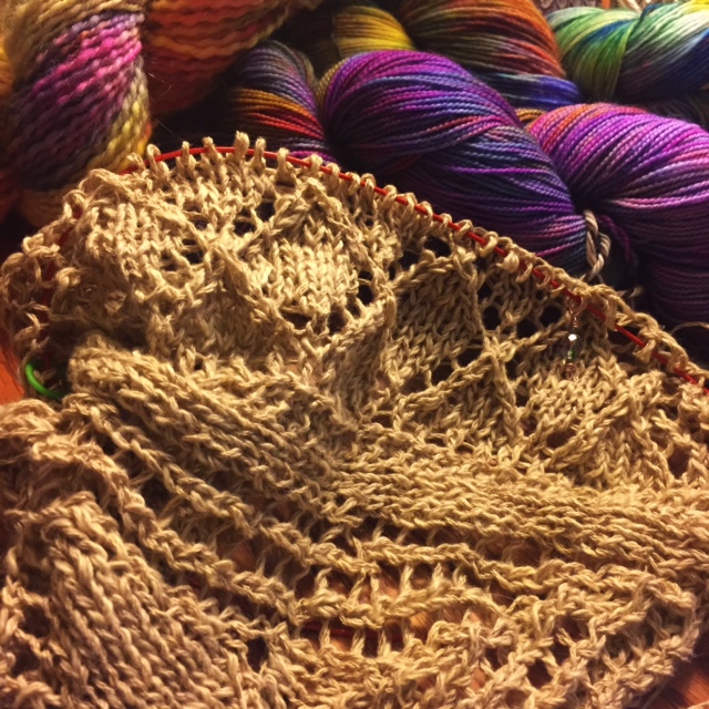  Venessa's Five Points Shawl in progress... posing in front of some new Vocabulary Yarn colors that will be appearing online soon. 