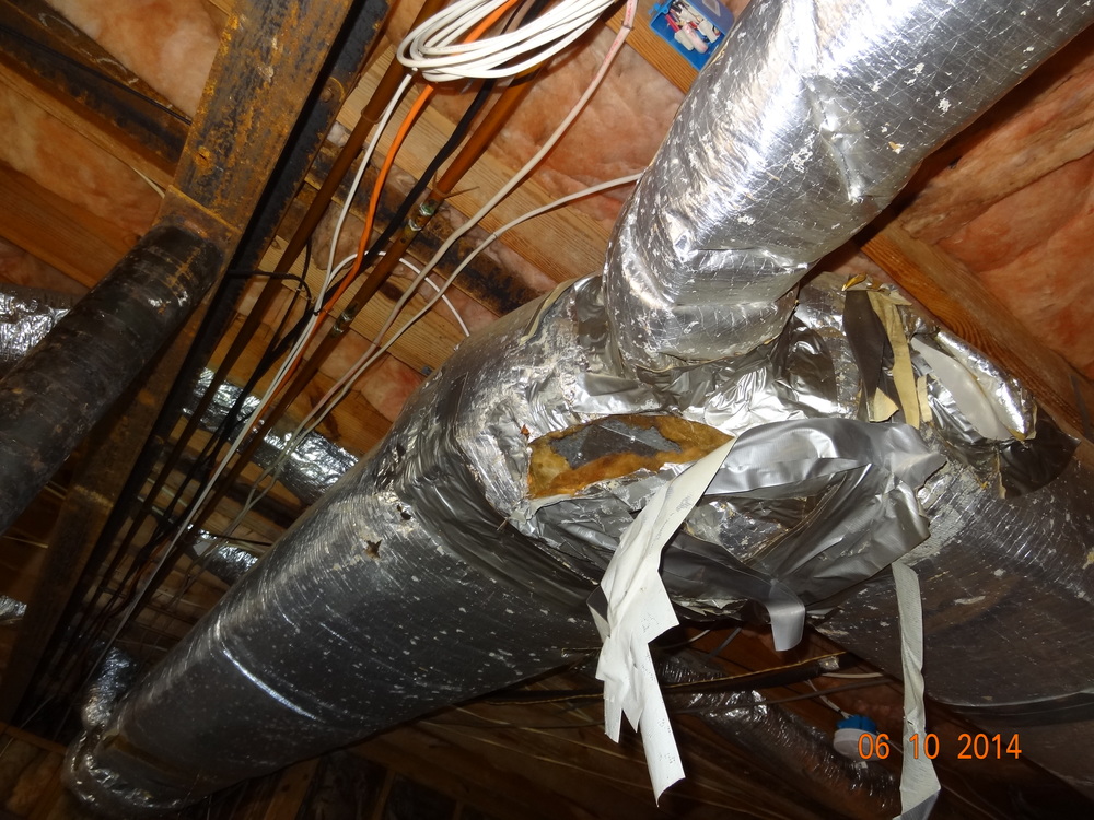 Photos — Environmental Services Group Carolinas LLC Water Dripping From Vent Pipe In Basement