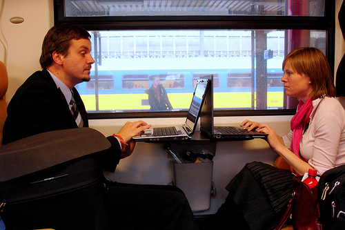 train-riders-on-laptops