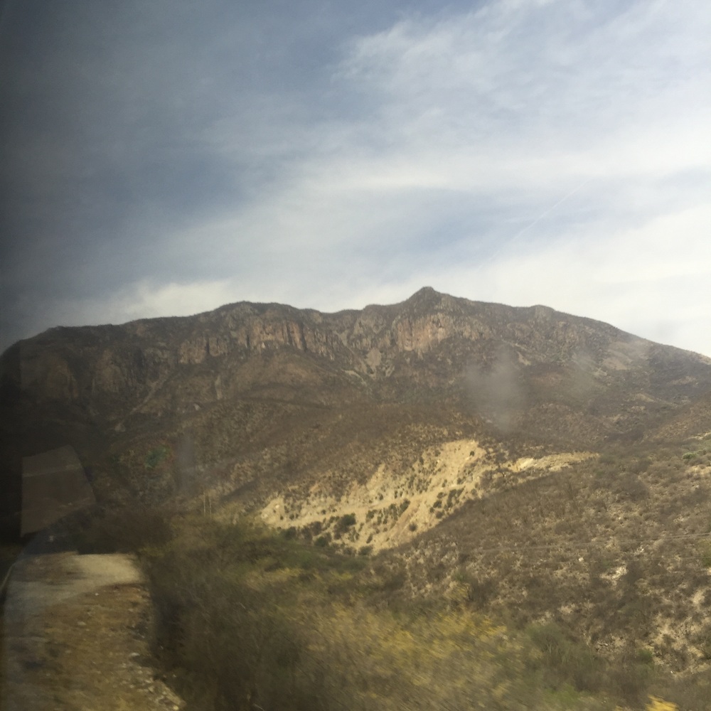 Sierra Gordas from our bus window - arid, rocky landscape