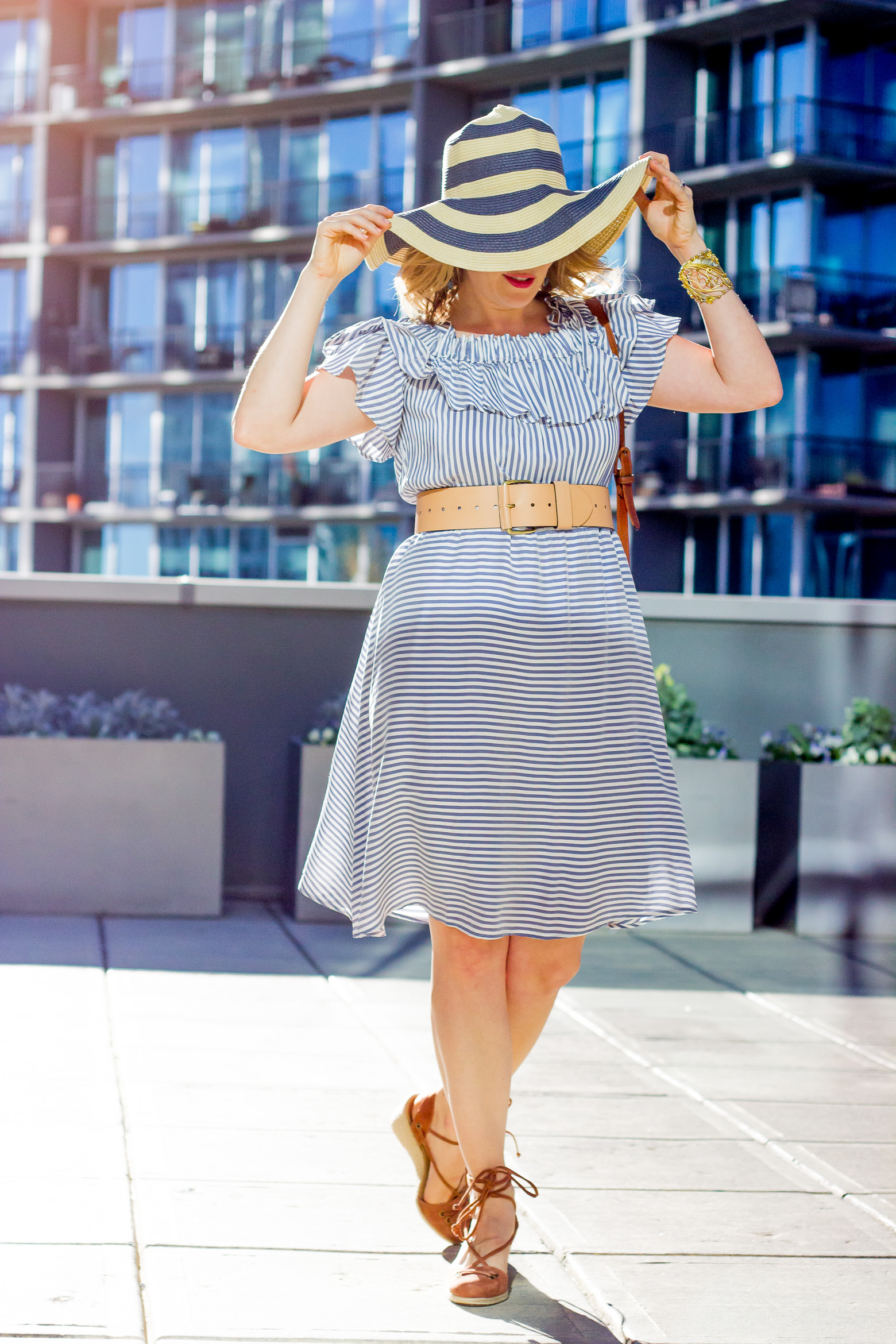 Striped ruffle dress worn by Atlanta blogger Elise Giannasi