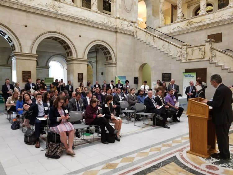 Peter Rothstein, President of NECEC, addresses the attendees at the Massachusetts State House