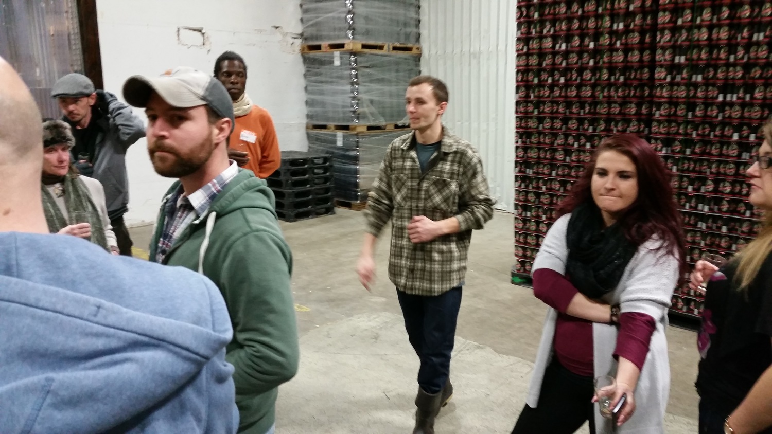  Tyler leads the group through the massive Geary's packaging room&nbsp; 