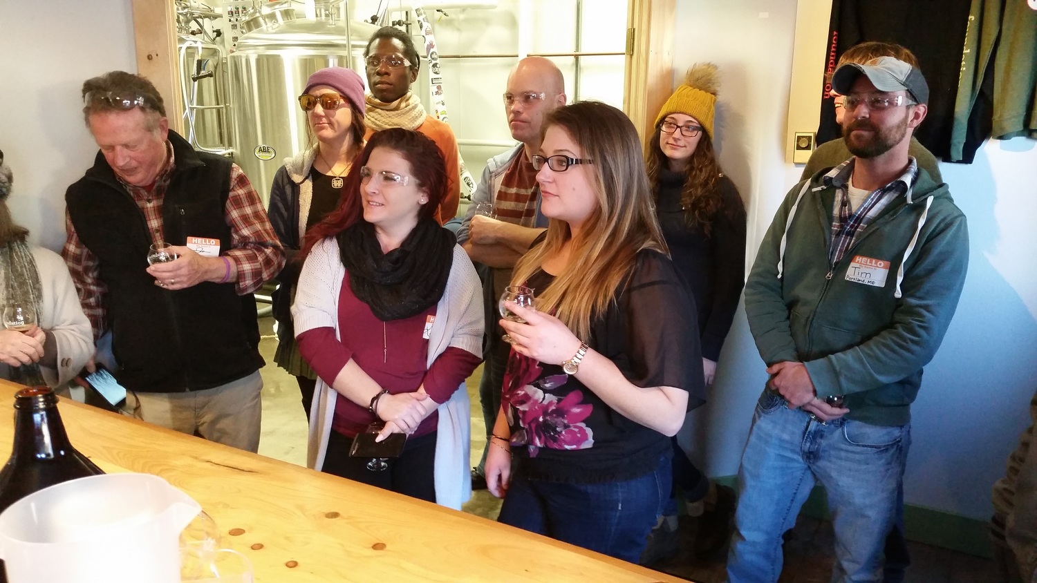  The Andy's group listens to Foundation Brewing's Adam Stein describe the company and the beers.&nbsp; 