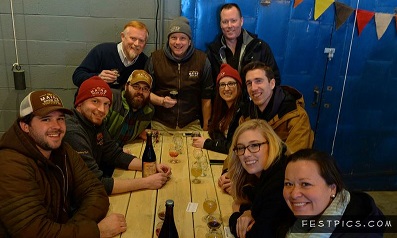 A staff photo from Night Shift Brewing in Everett, MA taken one year ago in January 2015. Clockwise from left: Kevin, Tim, Zach, Aaron, Don, Haley, Julia, Adam, Ashlee, Leanne.