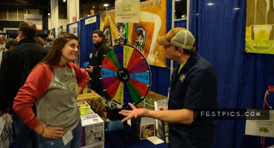 Trying to explain the correct answer to a friend from Boston Beer Company. Photo by FestPics