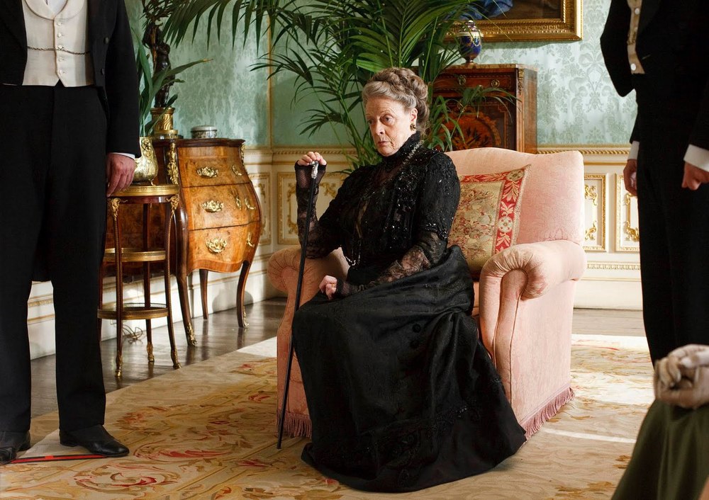 The Dowager Countess in a room with an Aubusson rug