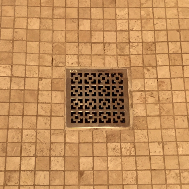 Love this decorative drain cover!