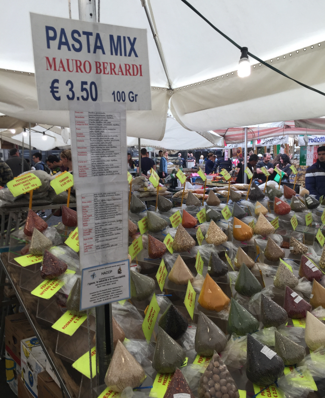 I was struck by the packaging on these spices, herbs and dried beans, etc at the market in Campo de' Fiori