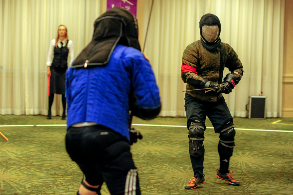Ben Floyd ( blue)  and Axel Pettersson (Green) face off in Open Longsword finals.