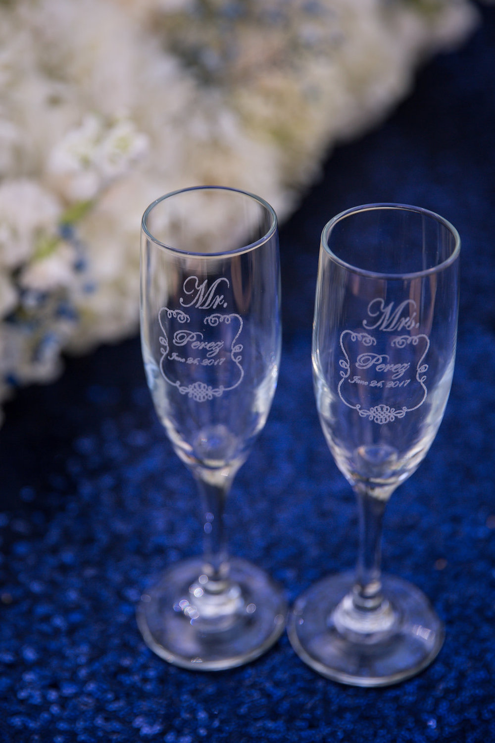 Engraved Bride and Groom Champagne Flutes - A Blue + Gold Rancho El Toro Courtyard Wedding - Oana Foto