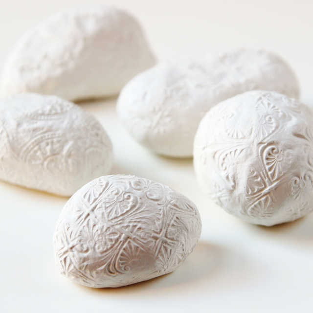 Make these Diy Embossed Clay Stone Paperweights using air dry clay