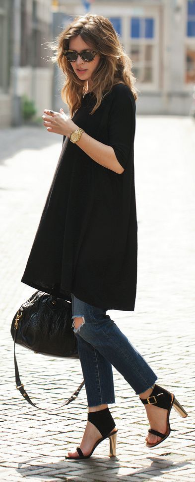 The little black dress in a tunic. Worn over jeans. Chic and hip come together via Brit+Co.