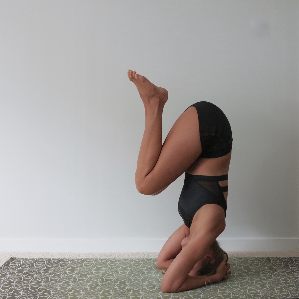 Image result for headstand knees tucked