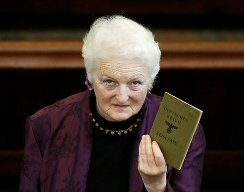 Julia Neuberger with her grandmother's J-stamped passport (Photo: Reuters)