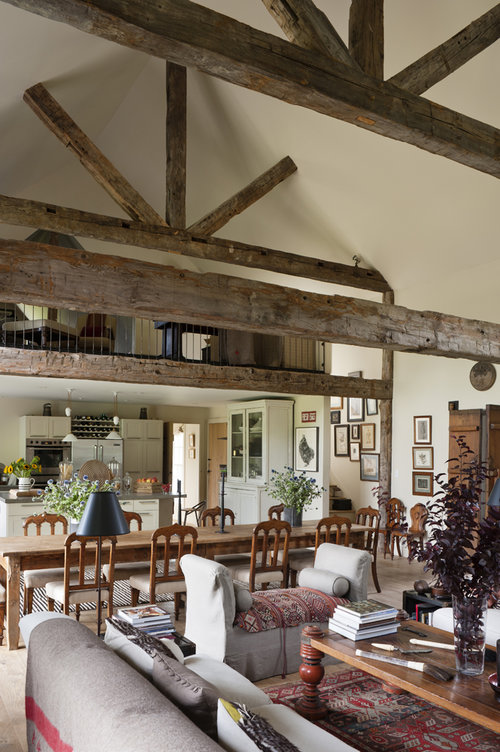 The home's interior, with Reclaimed Hand Hewn Beams by The Hudson Company.