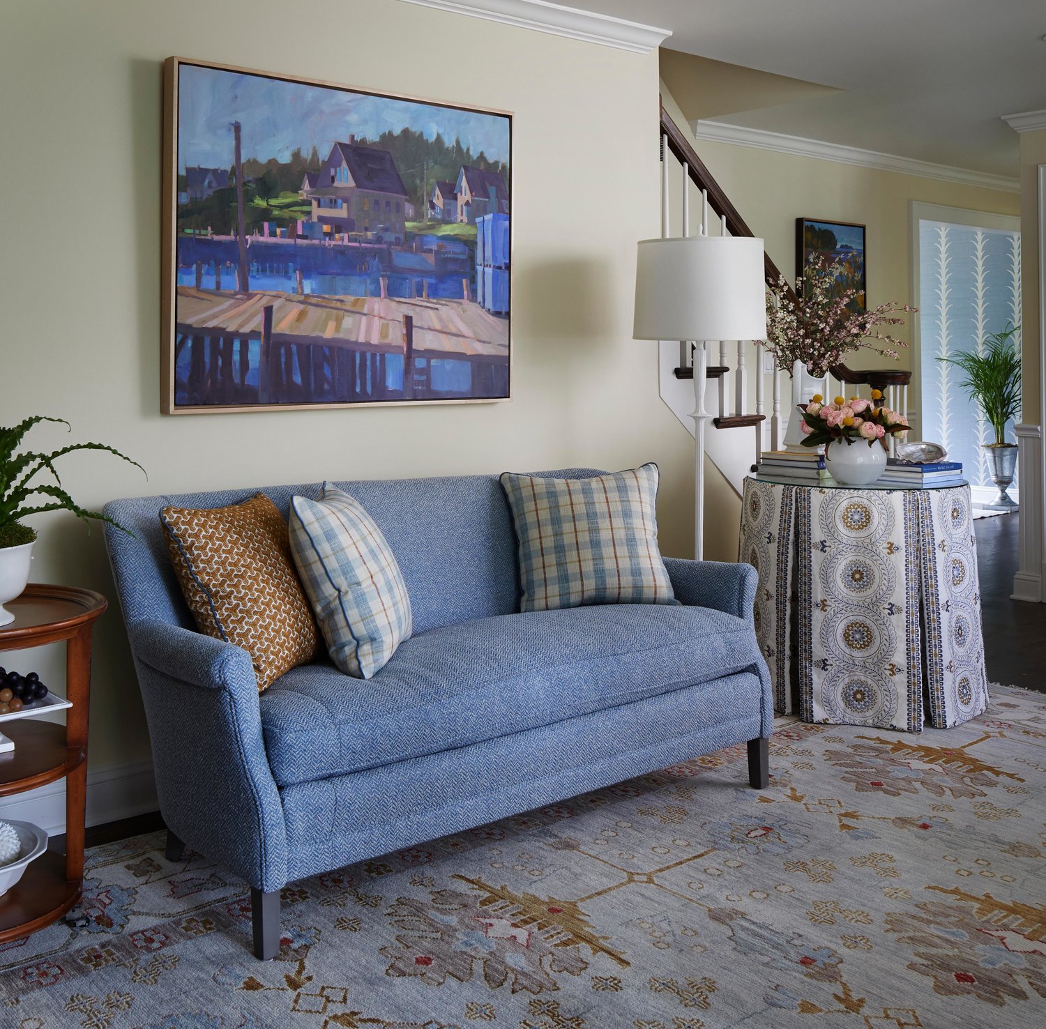 Traditional living room with blue loveseat. Come see more interior design inspiration from Elizabeth Drake. Photo by Werner Straube. #interiordesign #classicdesign #traditionaldecor #housetour #elizabethdrake