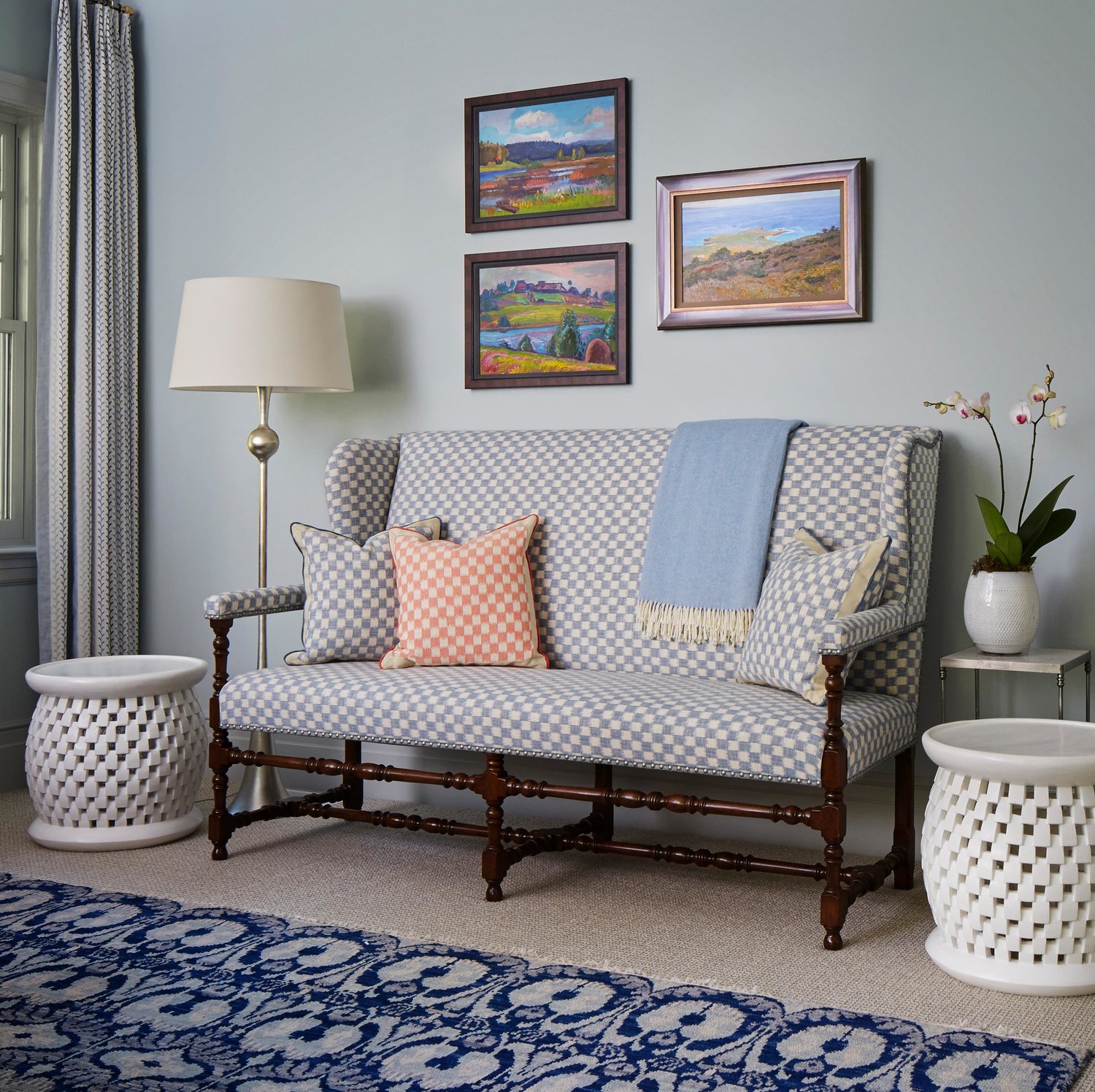 Charming check on a settee in a blue bedroom. Come see more interior design inspiration from Elizabeth Drake. Photo by Werner Straube. #interiordesign #classicdesign #traditionaldecor #housetour #elizabethdrake