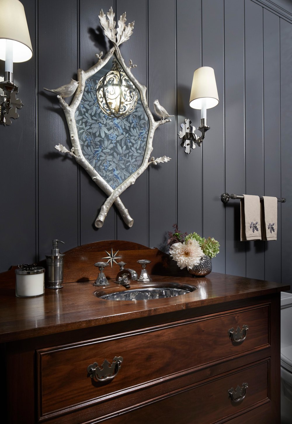 Rich dark painted paneling and wood vanity in a bathroom. Come see more interior design inspiration from Elizabeth Drake. Photo by Werner Straube. #interiordesign #classicdesign #traditionaldecor #housetour #elizabethdrake