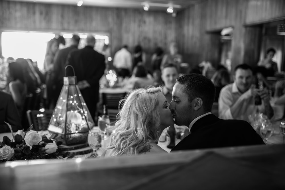 Bride and Groom kissing at wedding