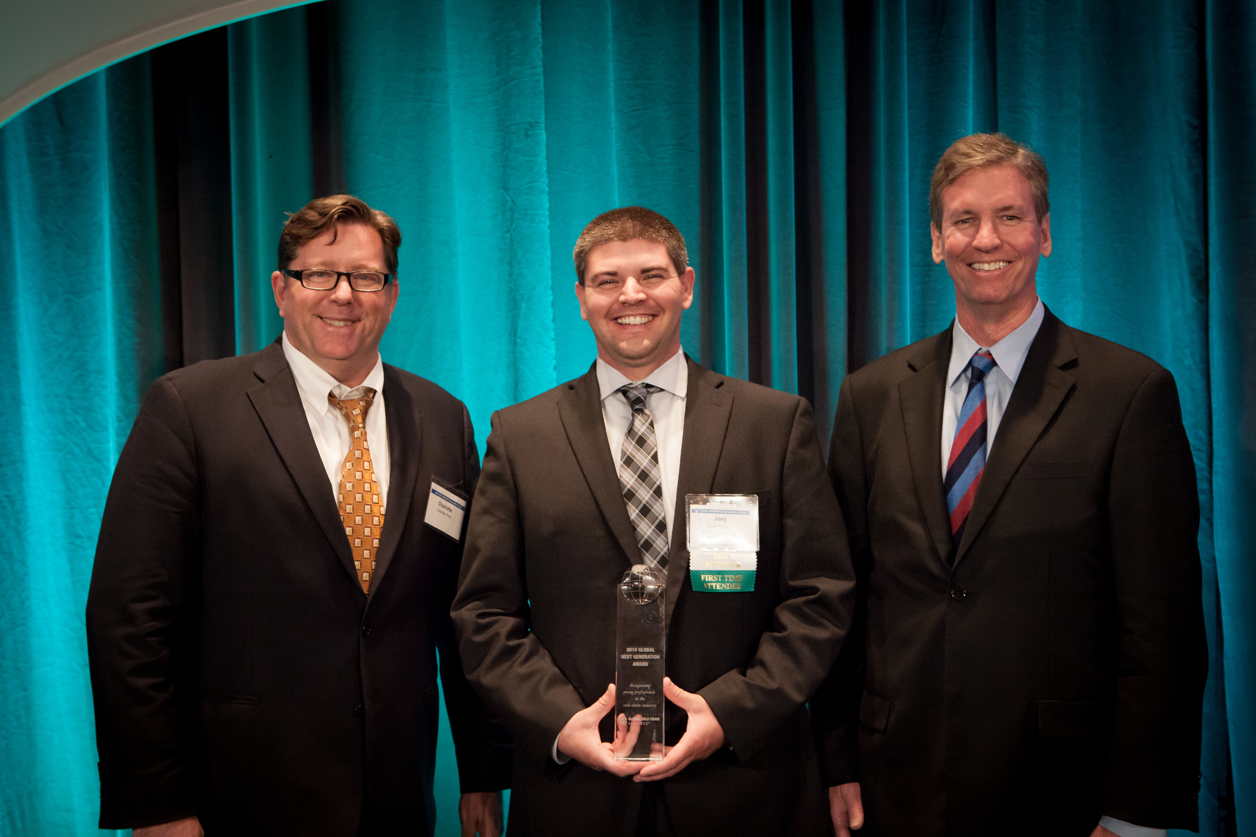     2014-2015 WFLO Chairman Frank Plant (left) and 2014-2015 IARW Chairman Tom Poe (right) pictured with the 2015 GCCA Global NextGen Award winner Joey Williams.   