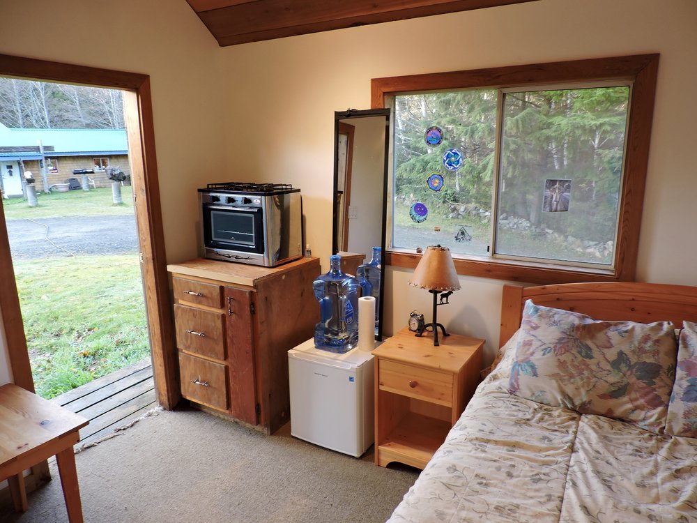 A rustic cabin rental is also available with queen sized bed, mini fridge &amp; propane stove