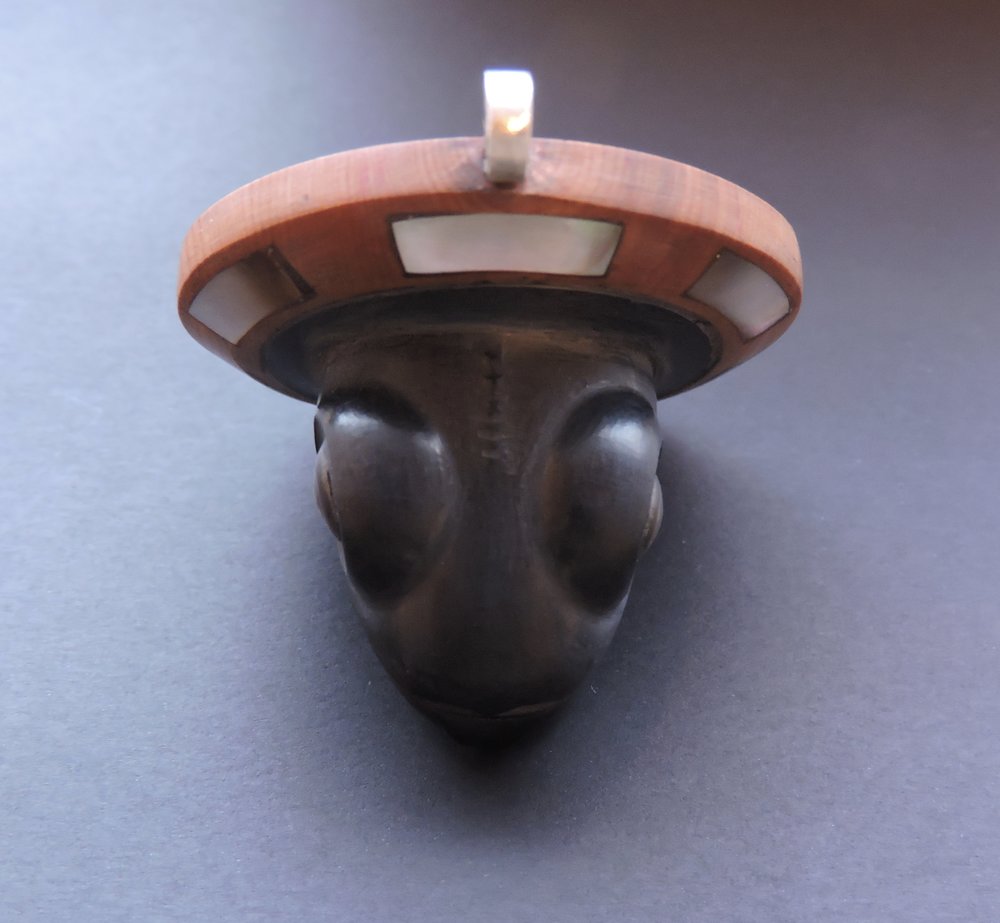 Top view of this one-of-a-kind argillite pendant
