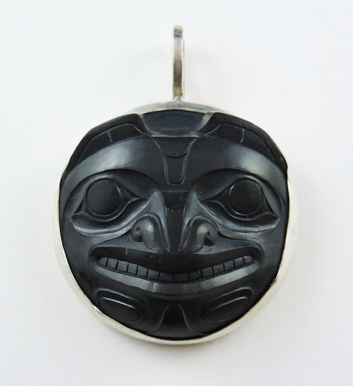 This Bear Medallion set in sterling silver is carved by Haida Artist Marcel Russ. This piece can be purchased on our website.