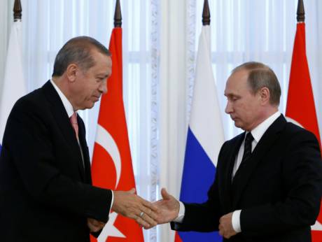Turkish President Tayyip Erdogan shakes hands with Russian President Vladimir Putin during a news conference in 2016. (Reuters)
