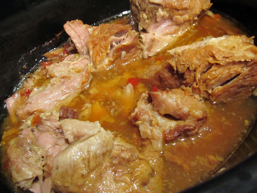 There's no way, that I've found, to make partially cooked meat in a pot look great. Nonetheless, here are the carnitas at hour 4. 