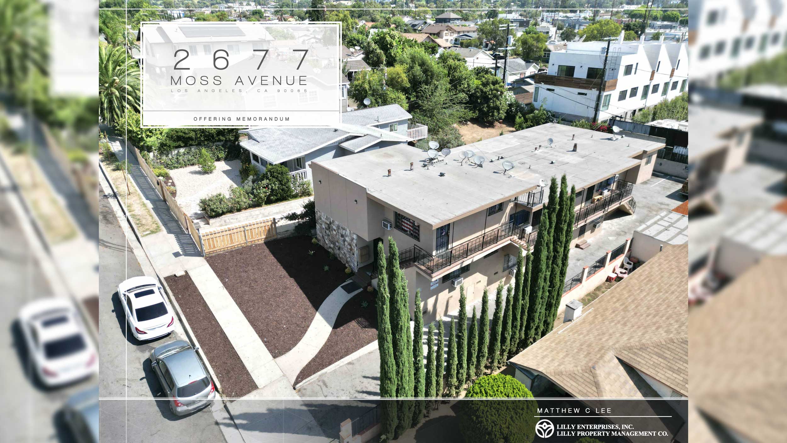 Aerial view of a residential building at 2677 Moss Avenue with greenery.