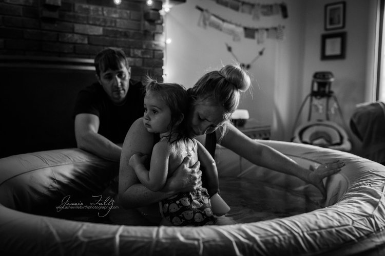 This mother leaned on her daughter during the intensity of labor. Beautiful work by Jessie Fultz. 