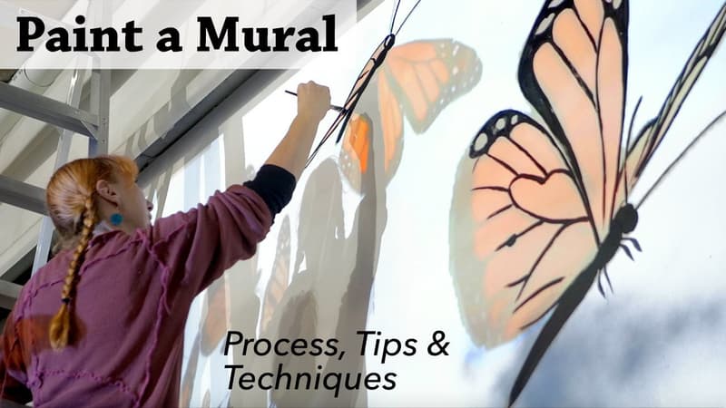 Paint a mural using brush and spray paints