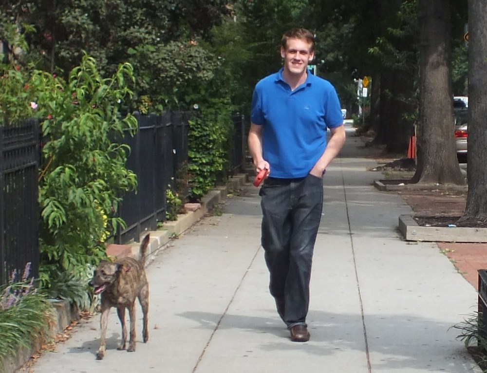 Owner Patrick Flynn walking one of his furry customers.