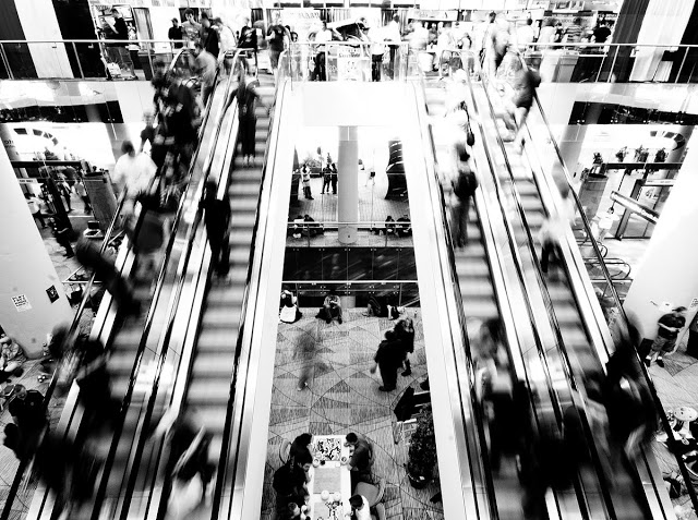 The Metro Toronto Convetion Center escaltor in motion and black and white